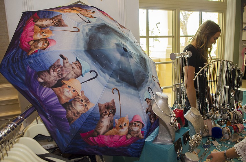 Panache'    Women’s Boutique displays its pet-oriented items such as this umbrella at Paws on the Catwalk on April 20 at The Ritz-Carlton, Sarasota.