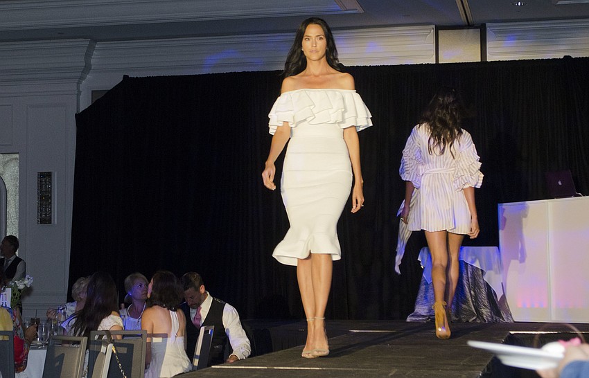 Models struts the runway in INfluence Style numbers during the fashion show at Paws on the Catwalk on April 20 at The Ritz-Carlton, Sarasota.