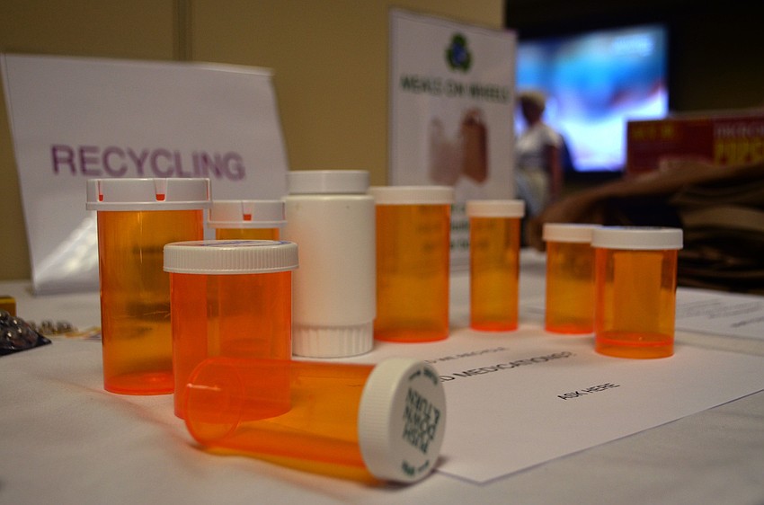 Residents collected various items to recycle, including old medicine bottles.