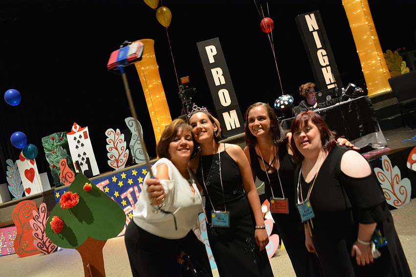 Adeline Morena grabs a selfie photo with her daughters Rosa Moreno and Jasmine Hindmas, and friend April Beckham.