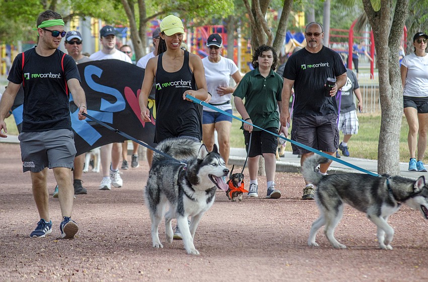 Nick and Thelma Cote participate in the Southeastern Guide Dog Walk-A-Thon in Payne Park.