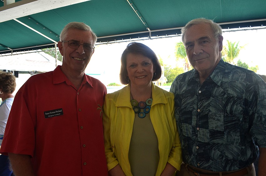 The Rev. Norman Pritchard and Elaine and Bill McClure