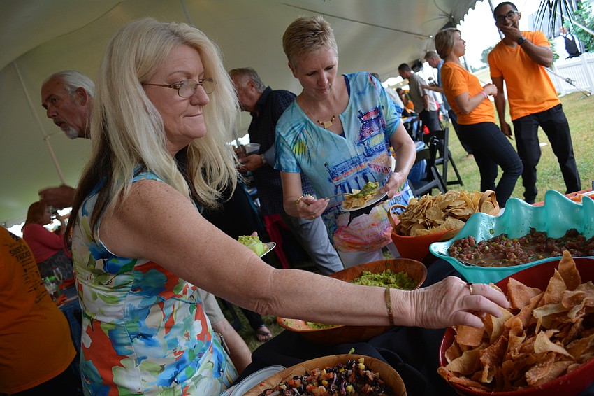Amy Webb, of It Works Global, fills up on appetizers.