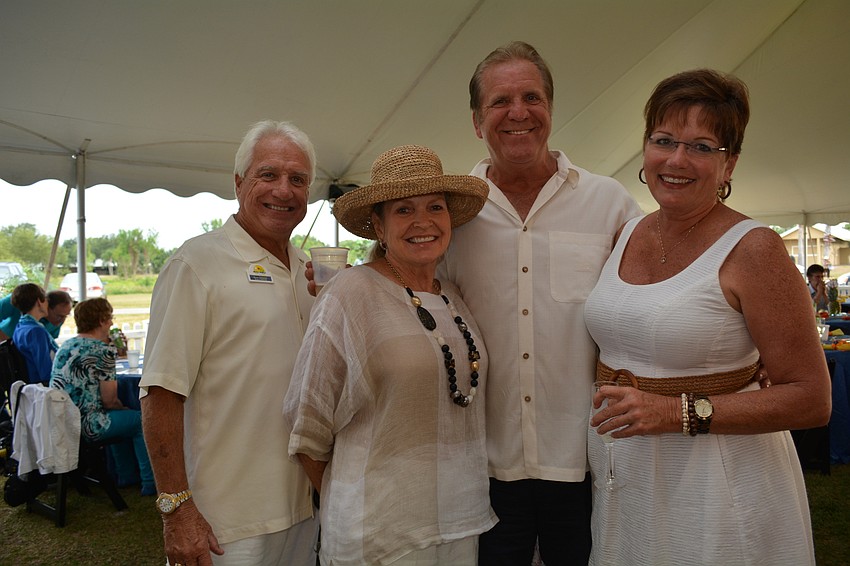 Meals on Wheels PLUS board member Mark Goodson with his wife, Veenie Goodson, and friends, Greg Bax and Sue Revell