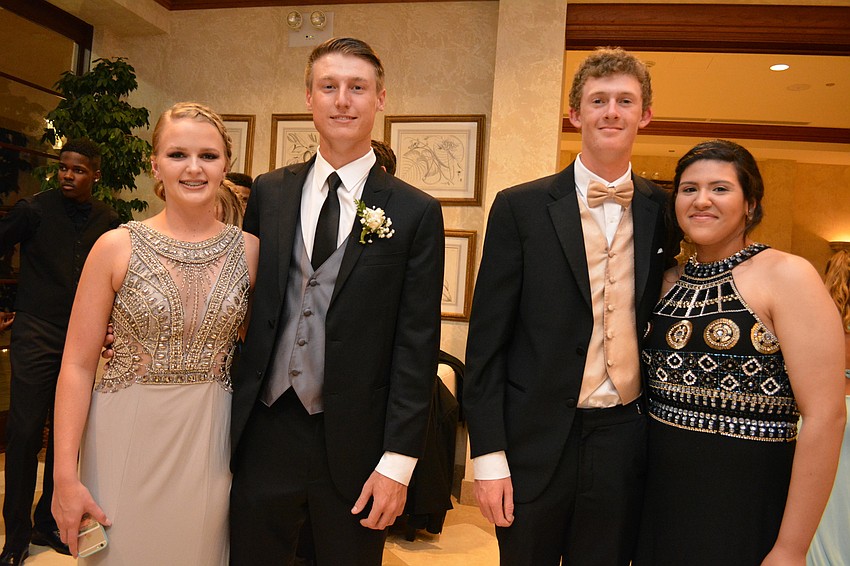 Lakewood Ranch High'  s Madison Pierce attends with ODA junior Nick Saranczak and friends Hunter Bogumil and Damaris Gomez.