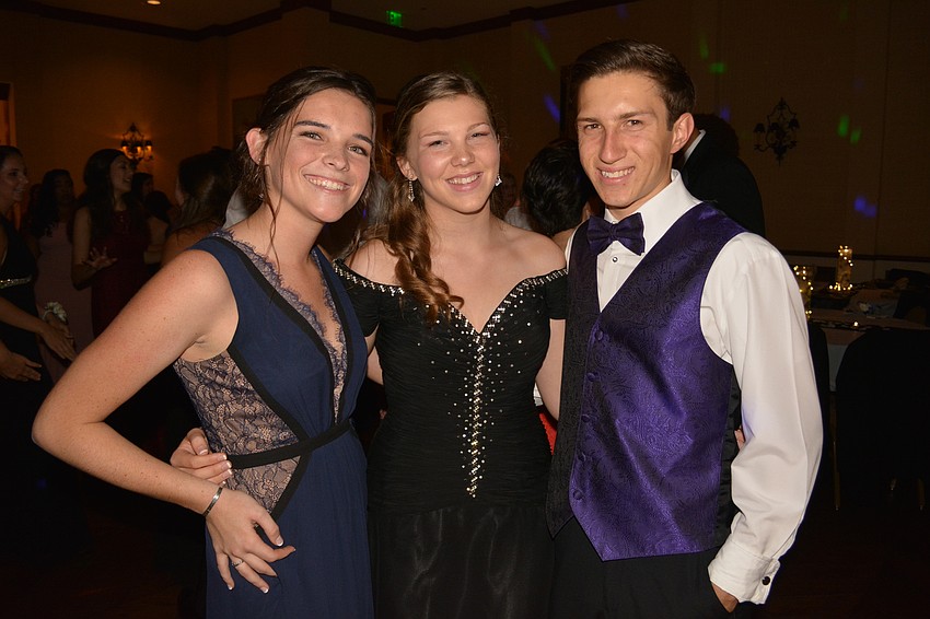Delaney Dowdell, Courtney Hamilton and Hunter Chalhub hit the dance floor early.