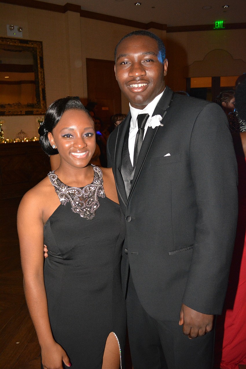 Kiarra Womack, a senior, brought Delvin Hill, a student at Booker High School.