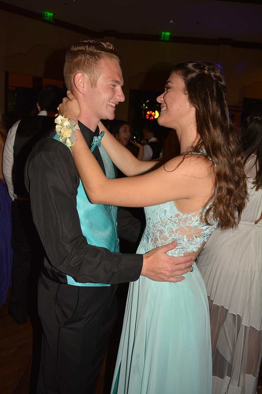 Tony Cheney dances with senior Nicole Vitiello