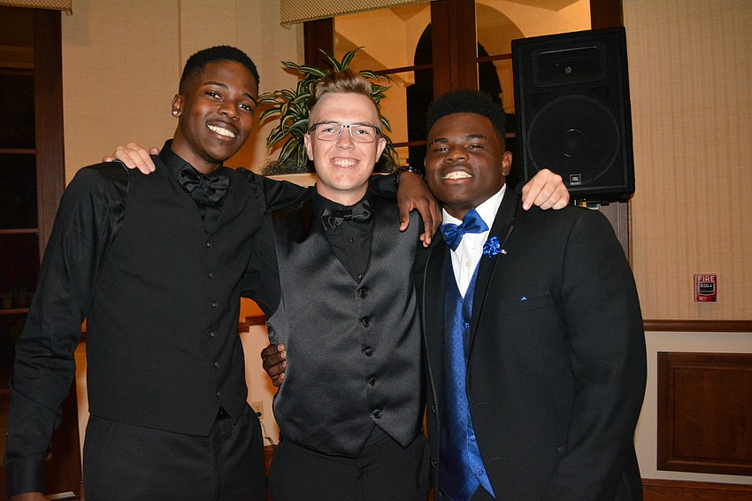 Kolbie Ward, Duncan Cappar and Najee Rhodes could barely stop dancing to pose for a photo.