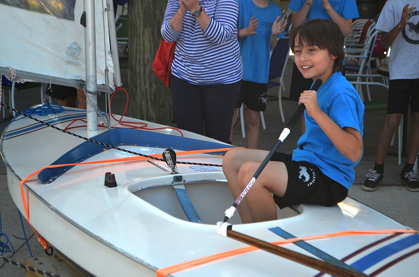 Sixth grader Mark Hornyak takes a turn on the Sunfish simulator.