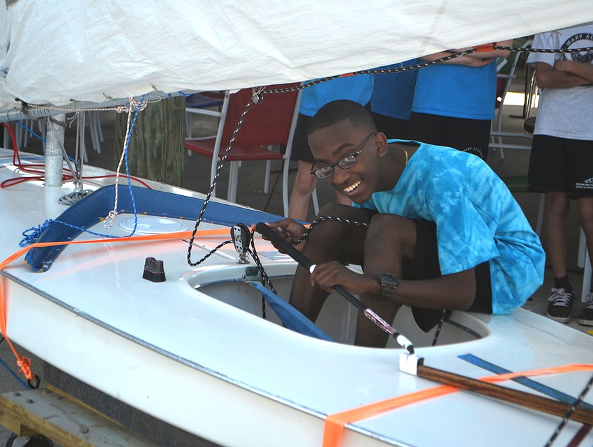 Seventh grader Andrew Baldwin practices sailing basics on the Sunfish simulator.