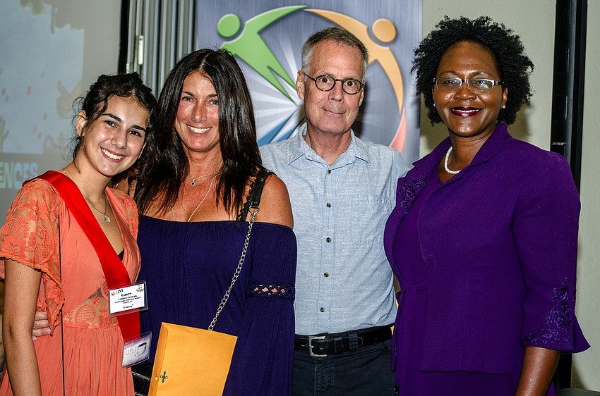 Pine View junior Casey Hunter Kessous, Deena Kessous, Jeffery Cornwell and Booker High School Principal Rachel Shelley