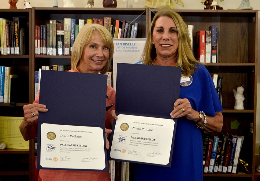 Dottie Rutledge and Nancy Rozance were recognized as Paul Harris Fellows.