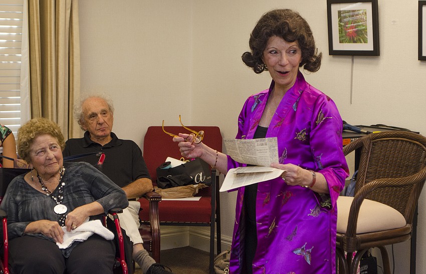 Carolyn Michel acts as Ann Landers in the first monologue of her Salon Series lecture on April 27 at Designing Women Boutique.