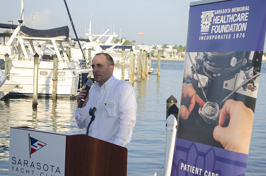 Sarasota Memorial Healthcare Foundation President Mason Ayres gives opening remarks at the pre-tournament reception on April 27 at Sarasota Yacht Club.