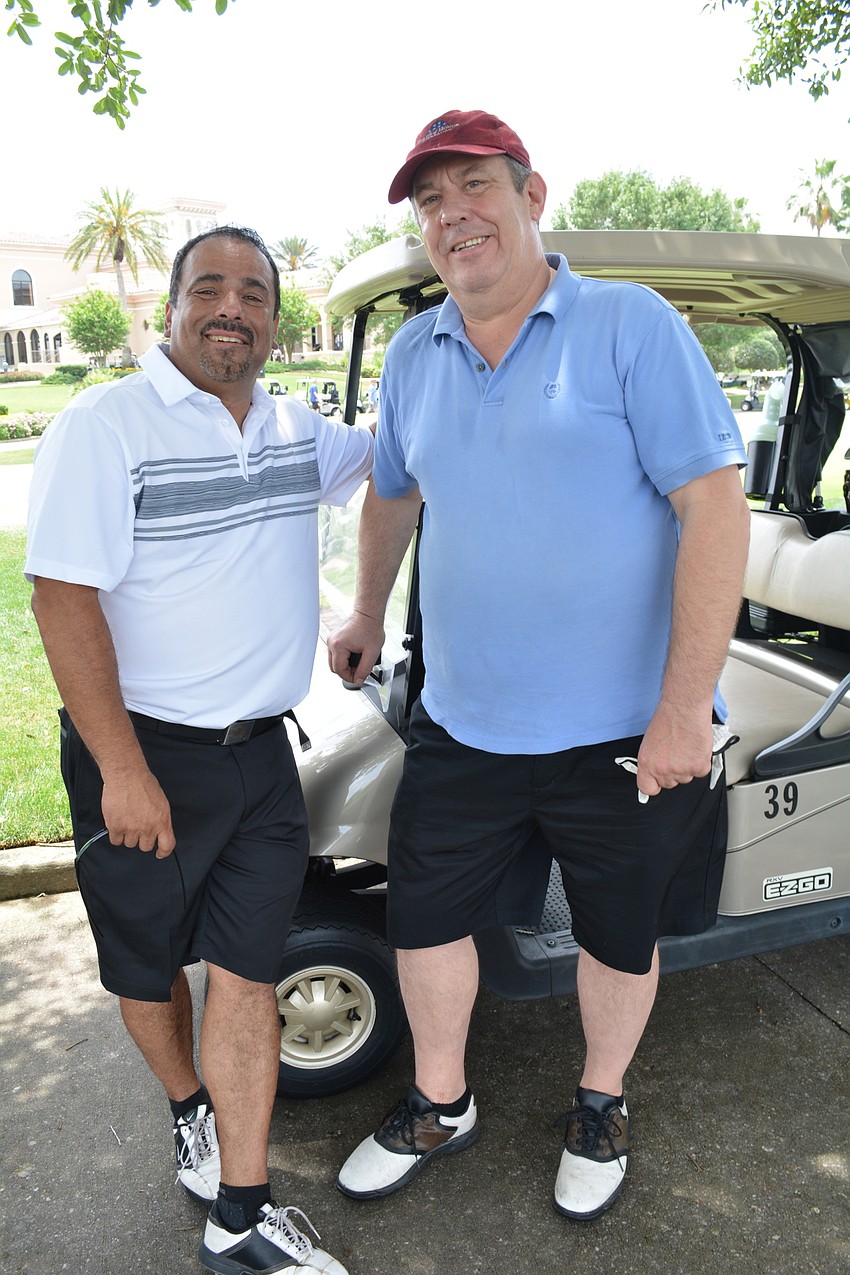 Greg Guevara, of California Pizza Kitchen, plays with Kenneth Kwiatkowski, with Bombino & Co.
