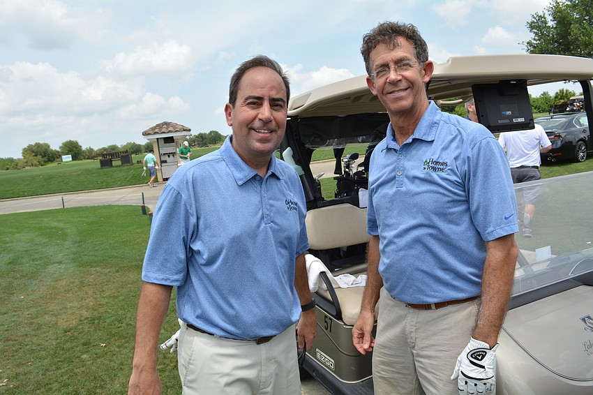 Homes by Towne'    s Orlando Priede and Wes Thompson came ready to play.