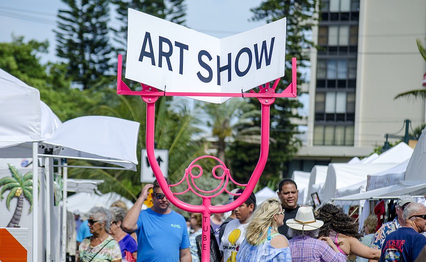 White tents lined Beach Road and Ocean Boulevard through Siesta Key Village.