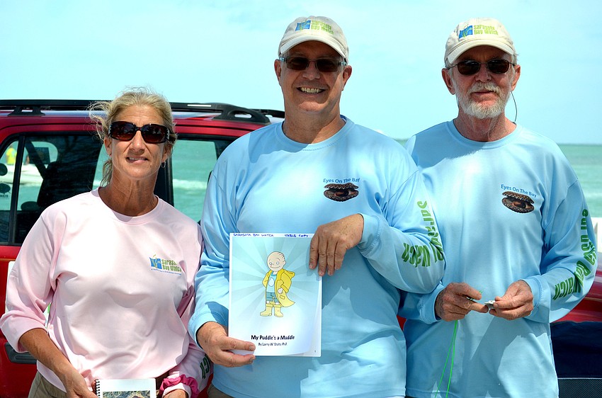Ronda Ryan, Larry Stults and Rusty Chinnis of the Sarasota Bay Watch