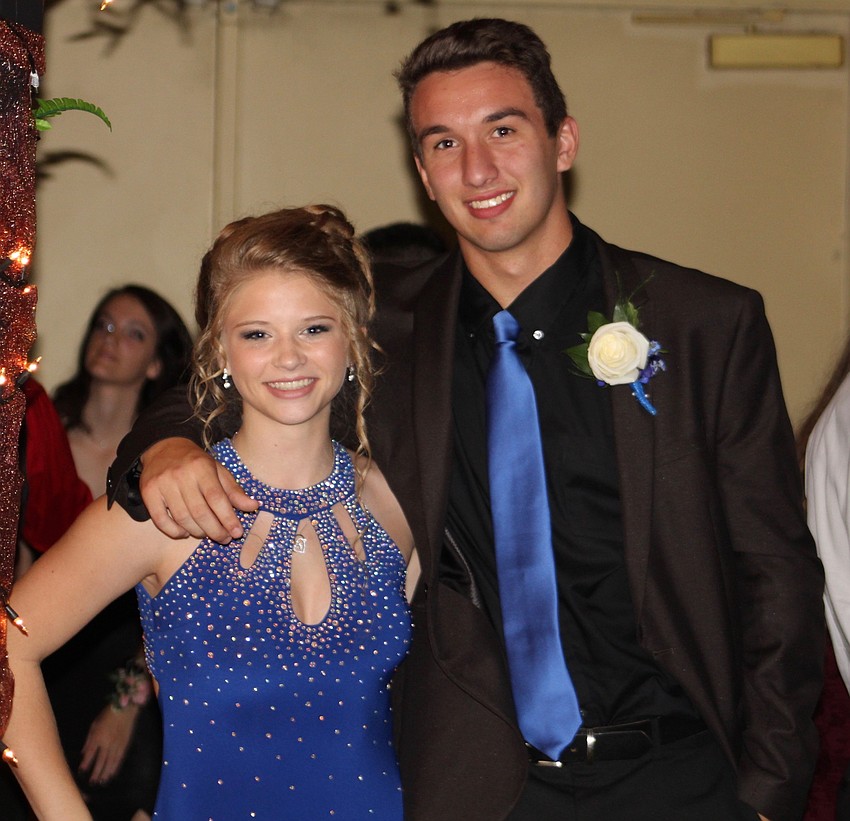 Braden River High School sophomore Jordan Agramonte and junior Nathan Cantin hang out during their high school prom.