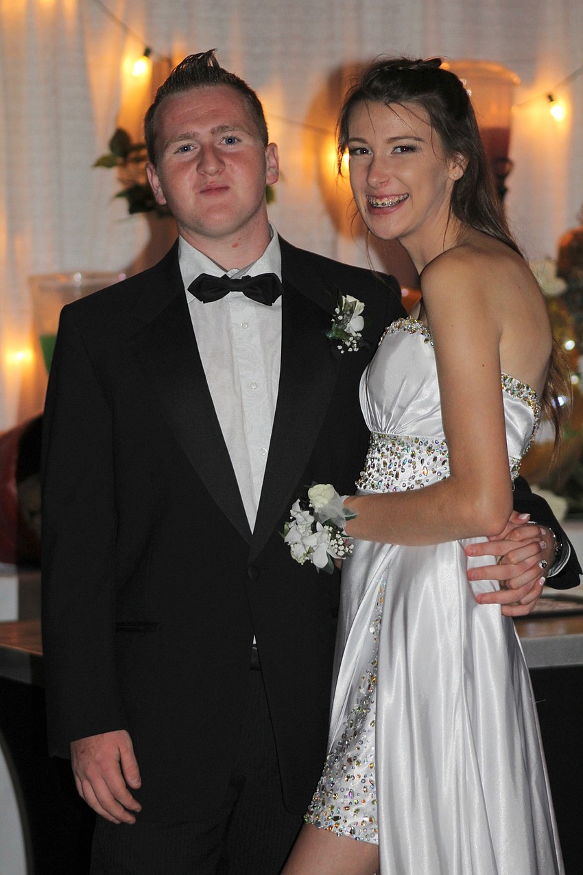 Braden River High School senior Chandler Hill and sophomore Reba Smith sport their matching prom apparel.