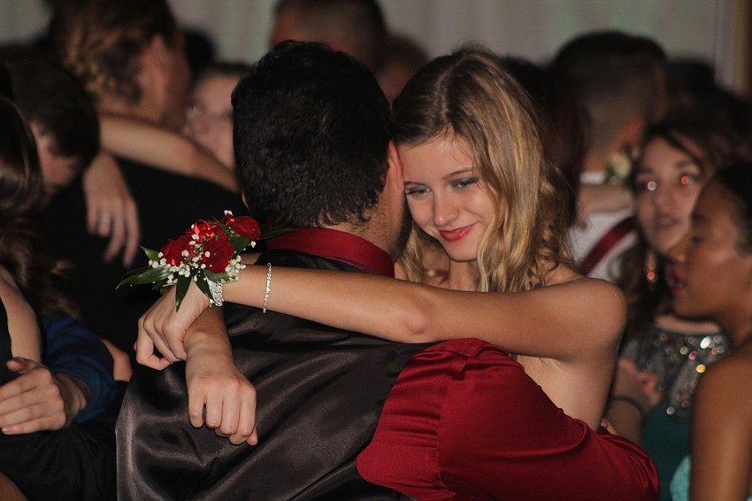 Braden River High School sophomore Alfredo Aguirre and junior Ashley Williams slow dance together during prom.