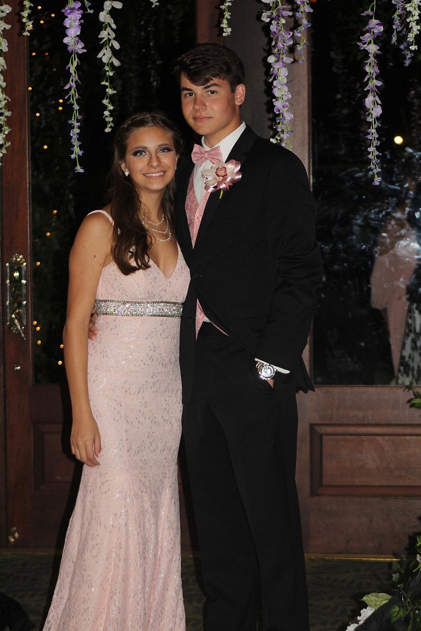 Braden River High School senior Dylane DeStasio and junior Evan Kirk arrive at their high school prom.