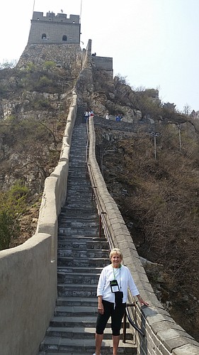 Chamber President Gail Loefgren, pictured here at The Great Wall of China, went on the trip last year. Courtesy photo