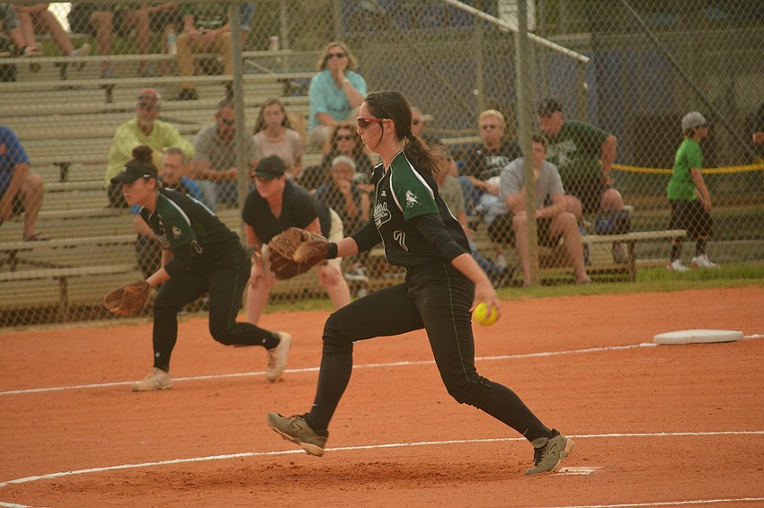 Logan Newton throws a first-inning pitch.