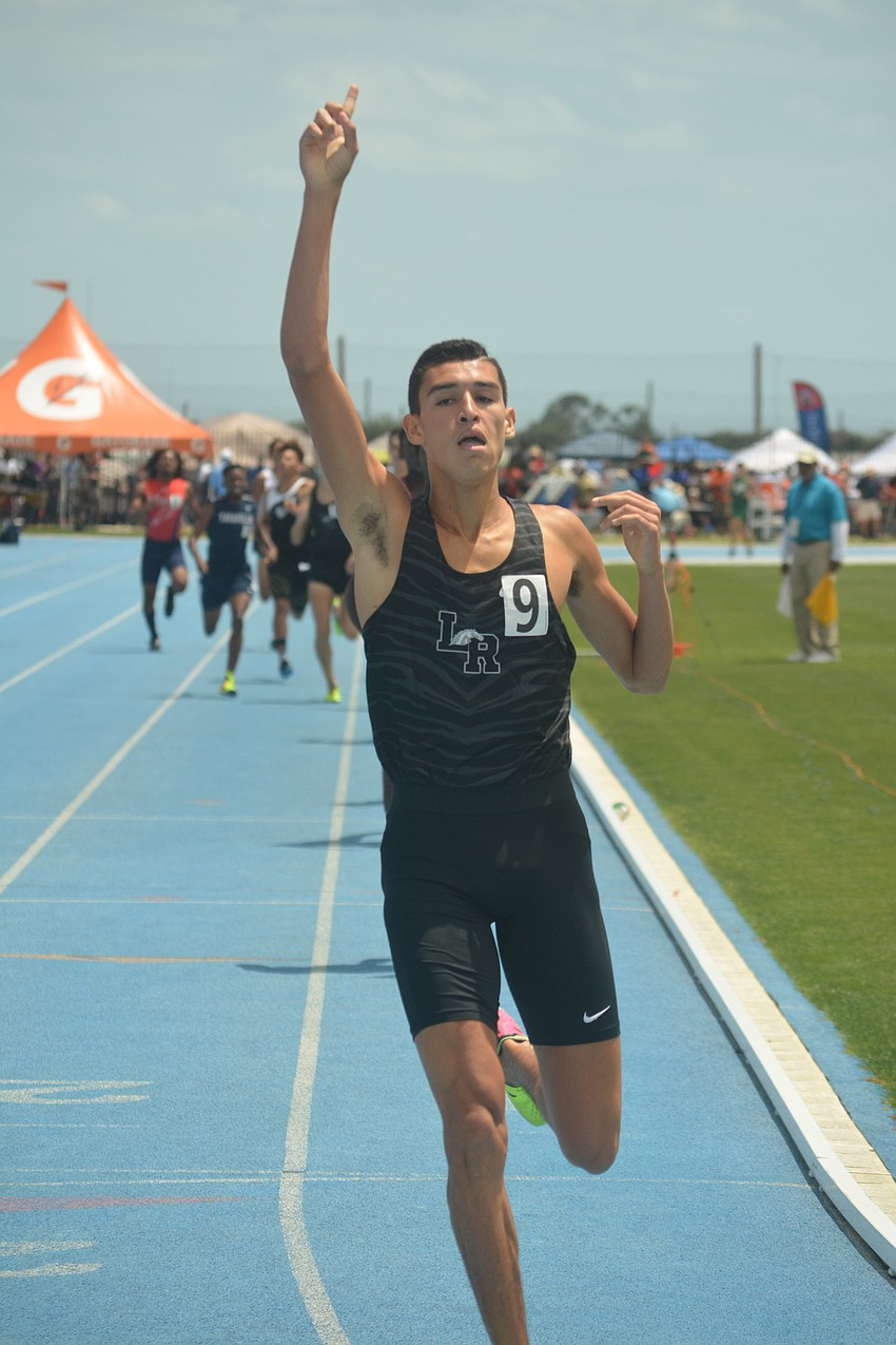 Lakewood Ranch senior John Rivera raises a 
