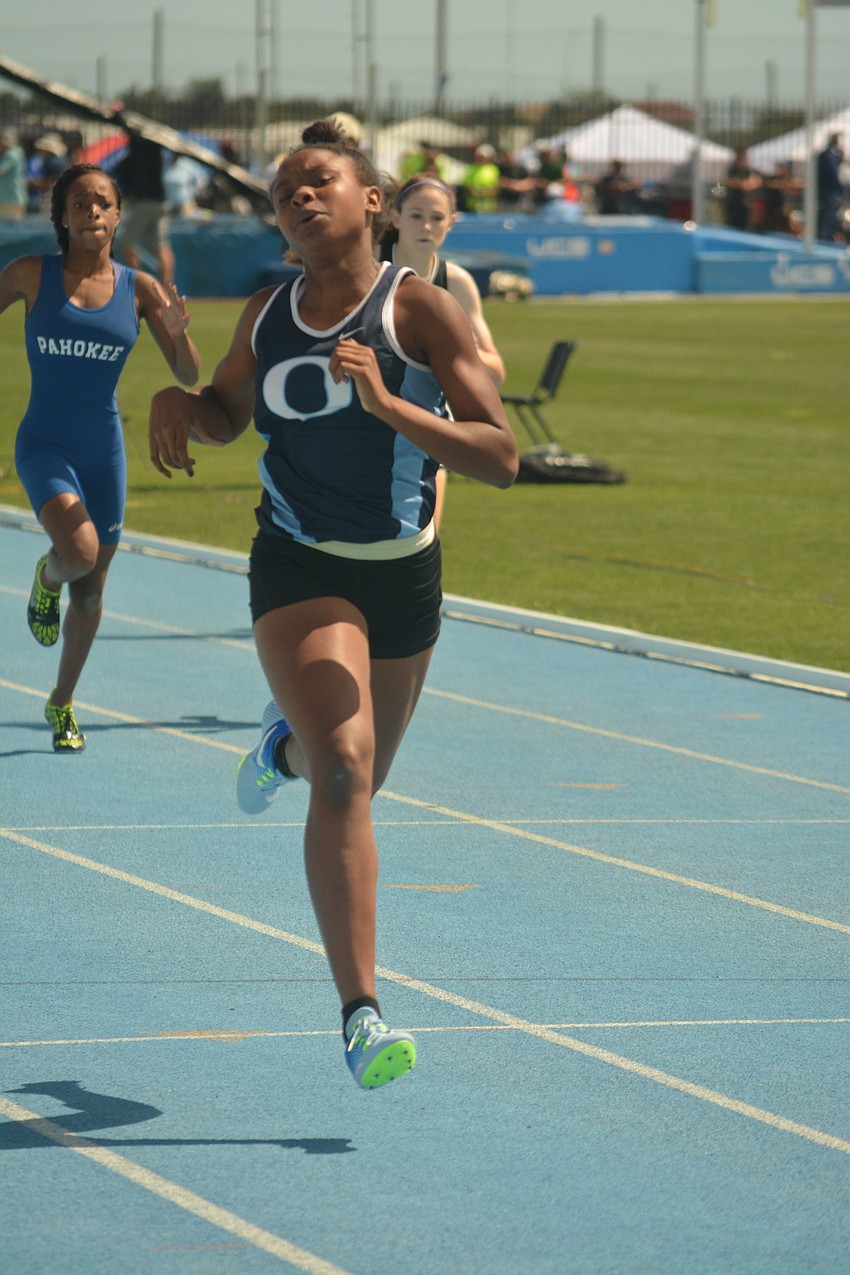 ODA'  s Saraiah Walkes opens up her lead in the Class 1 girls 400 meter preliminary race.