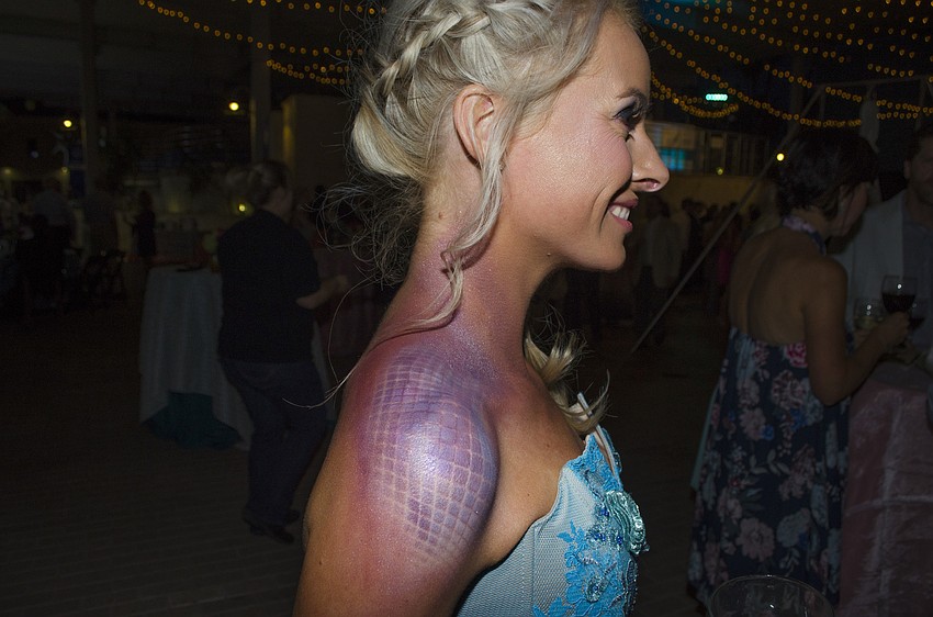Heather Hawley shows off her mermaid paint at A Fashionable Gala: Shipwrecked on May 5 at Mote Marine Aquarium & Laboratory.