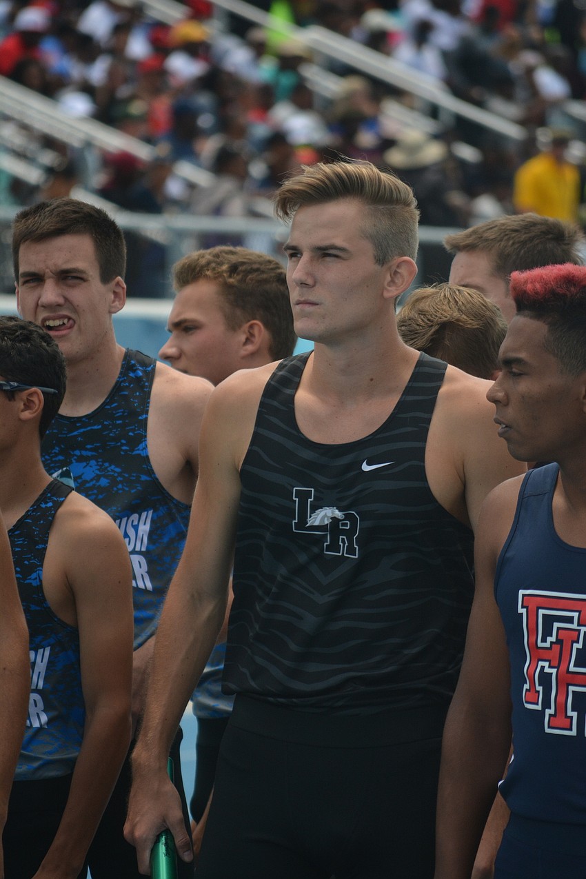 Lakewood Ranch'     s Andrew Dean gets serious before the boys 4x800 relay.