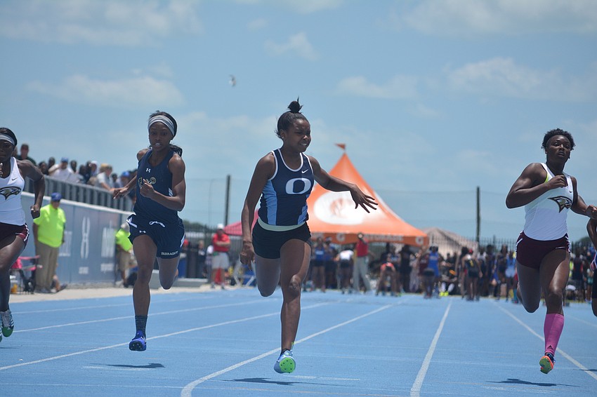 ODA'     s Saraiah Walkes stumbles across the finish line to win the Class 1A girls 100 meter dash.