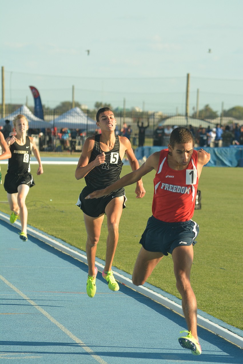 Lakewood Ranch'     s John Rivera can'     t quite catch Freedom'     s Timothy Doyle in the Class 4A boys 1600 meter race, despite a late push.