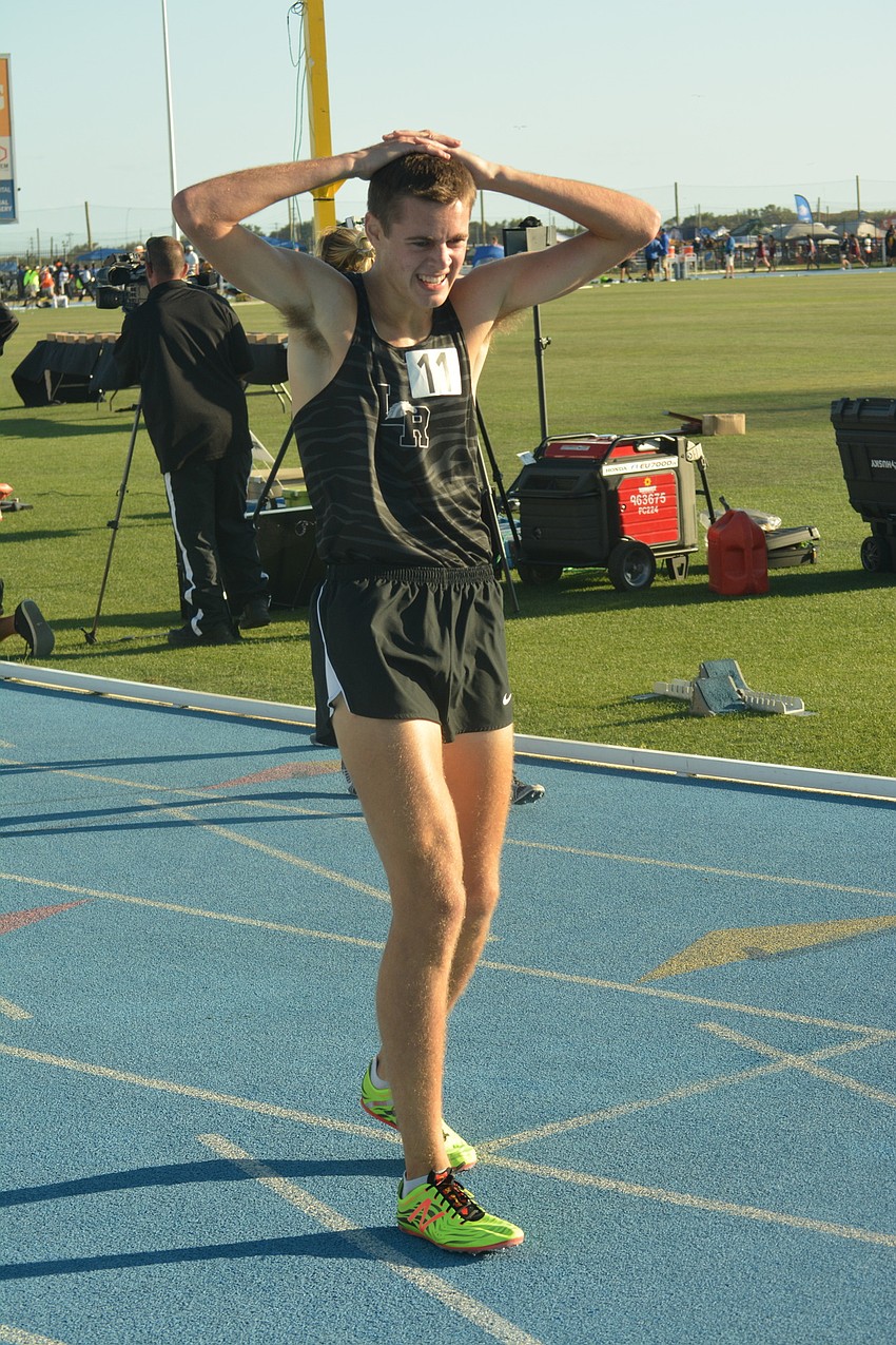 Lakewood Ranch'     s Johnny Reid put his hands on his head following the Class 4A boys 1600 meter race. Reid finished seventh.