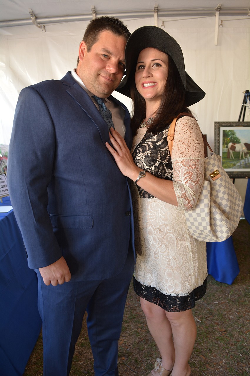 Shaun and Nichole Koby, of Parrish, attend with state representative Joe Gruters.