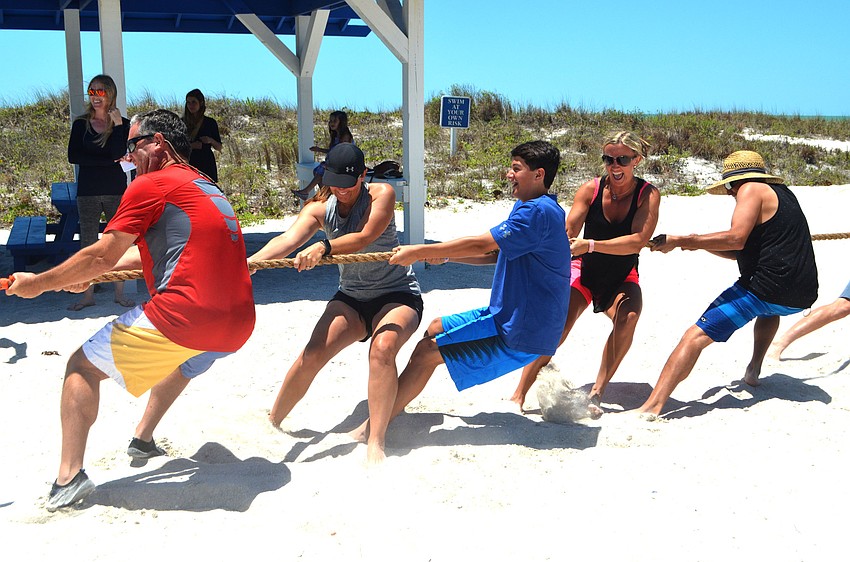 The fire department lost the tug of war match against the police department.