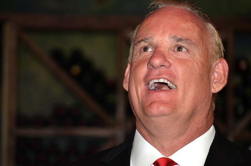 Martin Hyde smiles as he watches early voting results come in. He was one of three candidates in the runoff election for Sarasota City Commission.