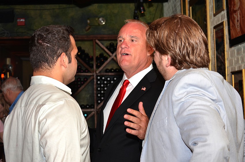 Martin Hyde mingles with supporters as he awaits election results on Tuesday.