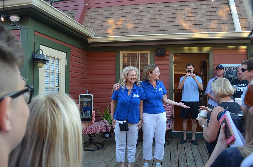 Jen Ahearn-Koch and Campaign Manager Kathy Kelley Ohlrich address the crowd at a Tuesday night election party.