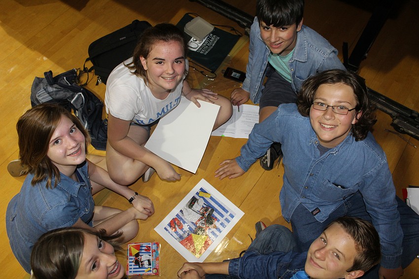 Braden River Middle School seventh grade STEAM team completes their first challenge, a jigsaw puzzle.