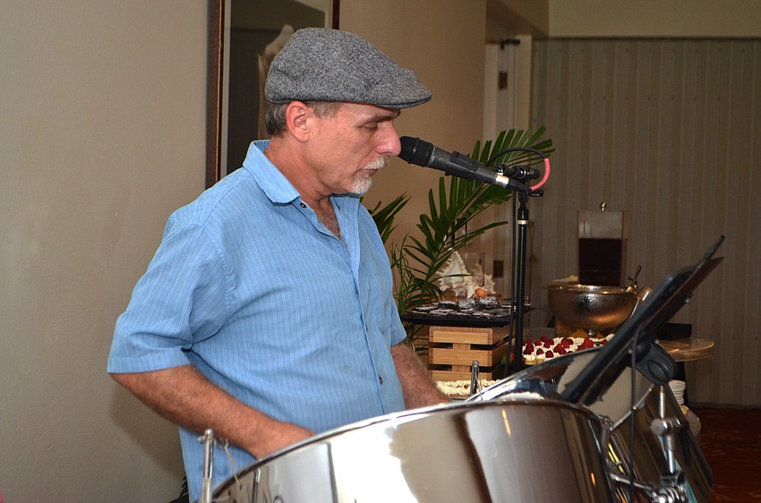 Steel drummer Rick Andre performed during the lunch.