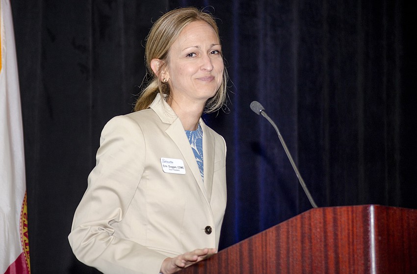 Visit Sarasota County Vice President Erin Duggan welcomes guests to the Visit Sarasota County National Travel and Tourism award luncheon.