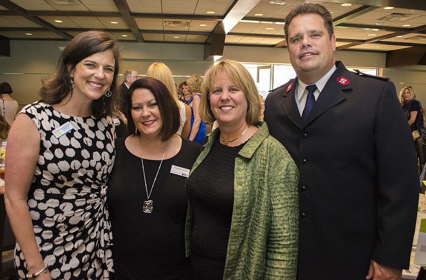 Executive Director of Glasser Schoenbaum Human Services Center Kameron Hodgens, Trish McConnell, Sandy Moser and Ethan Frizzell