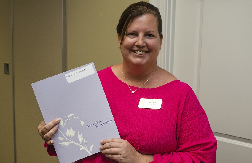 Melanie Custer accepted the grant awarded to Take Stock in Children on May 11 at Community Foundation of Sarasota County.