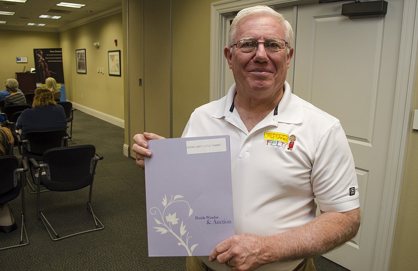 Dick Moore accepted the grant awarded to Feeding Empty Little Tummies on May 11 at Community Foundation of Sarasota County.