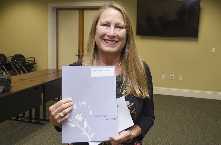 Ann Andrews accepted the grant awarded to Mothers Helping Mothers on May 11 at Community Foundation of Sarasota County.