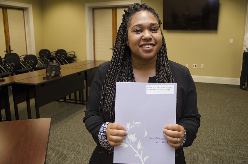 Xela Brutus accepted the grant awarded to The Community Haven on May 11 at Community Foundation of Sarasota County.