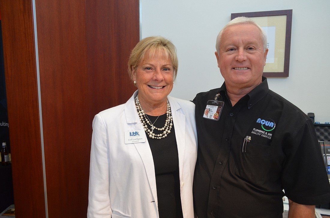Chamber President Gail Loefgren and John Wojtyna, of Aqua Plumbing and Air, who is sponsoring the event this year. File photo